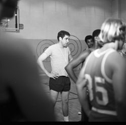IU South Bend men's basketball coach with team, 1970s