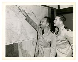 Jack Howard and another man looking at a map