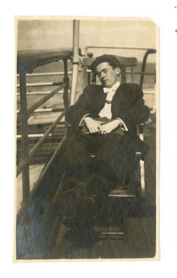 Young Roy Howard asleep on the deck of a ship