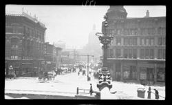 View from monument, looking west, day after snow, Jan. 17, 1911,10:40 a.m., street scene