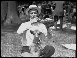 Frank Selmier feeding dog
