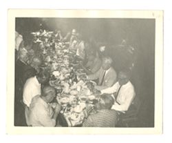 Group of men dining