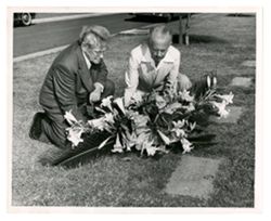 Roy Howard and another man at Ernie Pyle's grave