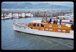 Titov party returning to S. F. Yacht harbor aboard Advenuress II