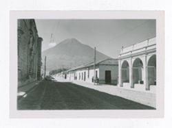 Buildings and street with mountain in background