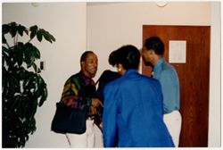 Charles Sykes and unidentified participants at In Touch with the Spirit reception