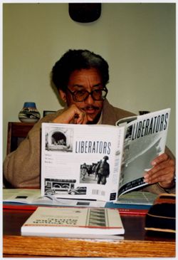 Asa Gordon reading Liberators book