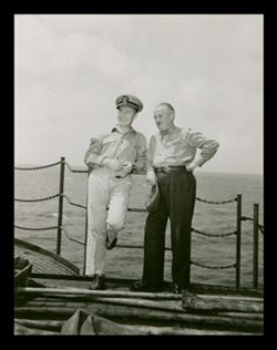 Roy W. Howard and military man at sea