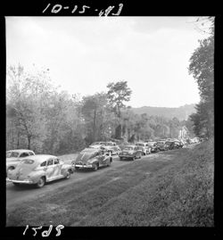 Parade of cars on 135 in autumn show for 1947
