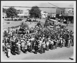 Hoagy Carmichael performing on piano (back of truck) for audience in La Grange, Georgia.