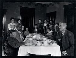 Men eating at table
