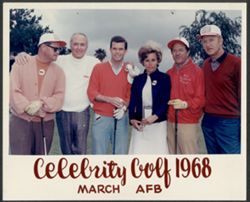 Randy Carmichael posing with unidentified people at the Celebrity Golf tournament.