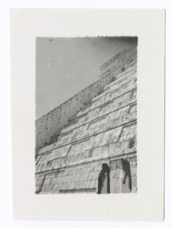 Item 0671. - 0674. Shots of Indigenous women standing by base of Castillo. In Items 671-672, there are two women, in Items 673-674, there are three.