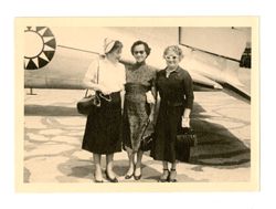 Naoma Lowensohn and Peggy Howard outside plane