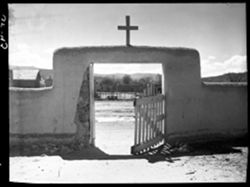 Looking through gate at Ranchos de Taos church