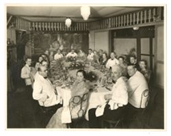 Roy Howard seated at formal dinner