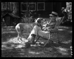 Ben Douglass with dog, at his home, Trevlac