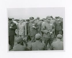 Roy Howard with men in military uniforms