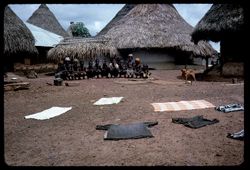 Sun drying laundry on ground, a common practice
