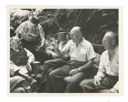 Men sitting and talking at Bohemian Grove