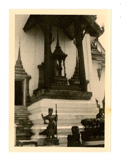 Wat spires, stairs, and statue