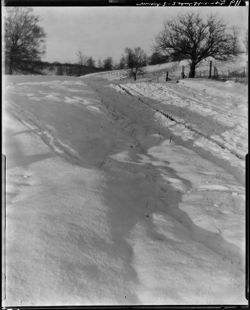 Near George Roush barn, roadway looking north, winter ("Over the Hill")