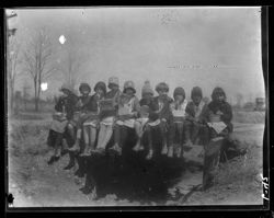 School children on bridge, dinner, near Haasetown