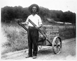 George E. Corbett, Jackson County "toting" his bed and baggage