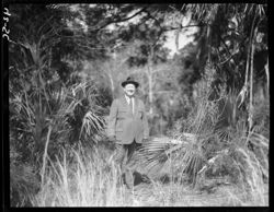 Dr. Davis among palmettos on Island