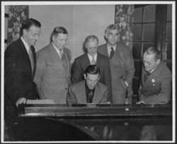 Hoagy Carmichael at the piano in the Kappa Sigma fraternity house.