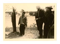 Jack and Michael Howard look at fish