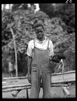 Boy at home of negro on way to San Luis