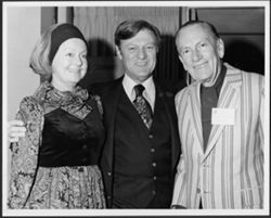 Hoagy Carmichael standing with an unidentified man and woman.