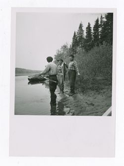 Men fishing on a shore