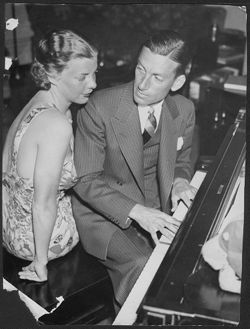 Hoagy and Ruth Carmichael at a piano.