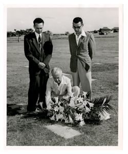 Roy Howard and other companions at Ernie Pyle's grave