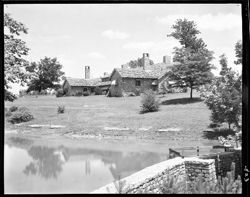 Distant view of lodge & pond