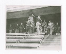 Military personnel giving a tour to Roy Howard