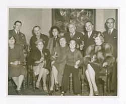 Mr. and Mrs. Roy Howard pose with others