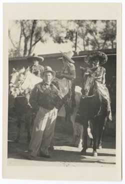 Item 0486. In foreground, standing, Eisenstein. Behind him, on horseback, a man and two women, all unidentified. Possibly taken at the Hacienda Tetlapayac.