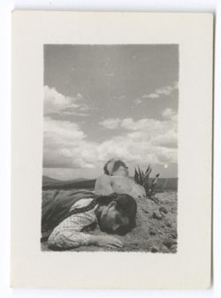 Item 0906. "Maria" lying across mound of earth in which "Sebastian is buried"