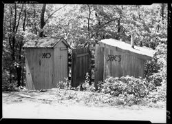 Toilets at lunch shack near bridge