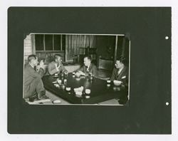 Roy W. Howard and friends smoking