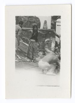 Item 1107. - 1109. Shooting scenes with penitents with cactus stems tied to their arms on the roof of the Cathedral. Eisenstein and Tissé (no shirt) in foreground.