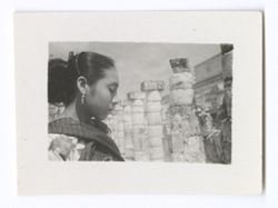 Item 0714. - 0723. Close-up, right profile shots of young Indigenous woman in colonnade at the Temple of the Warriors.