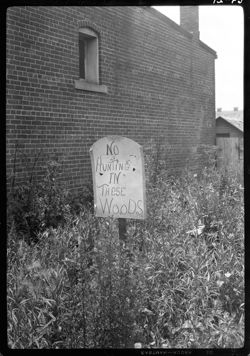 "Cut the weeds" sign near Bank at Brooklyn