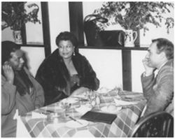 Ella Fitzgerald dining with Georgie and Norman Granz in Bristol, England