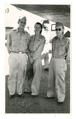 Three people in military uniform