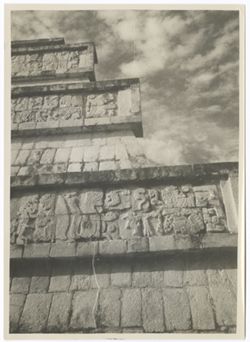 Item 0162. Close-up of corner of the Temple of the Warriors, showing four levels and carved friezes.