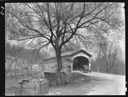 Covered bridge at foot of hill, near Connersville